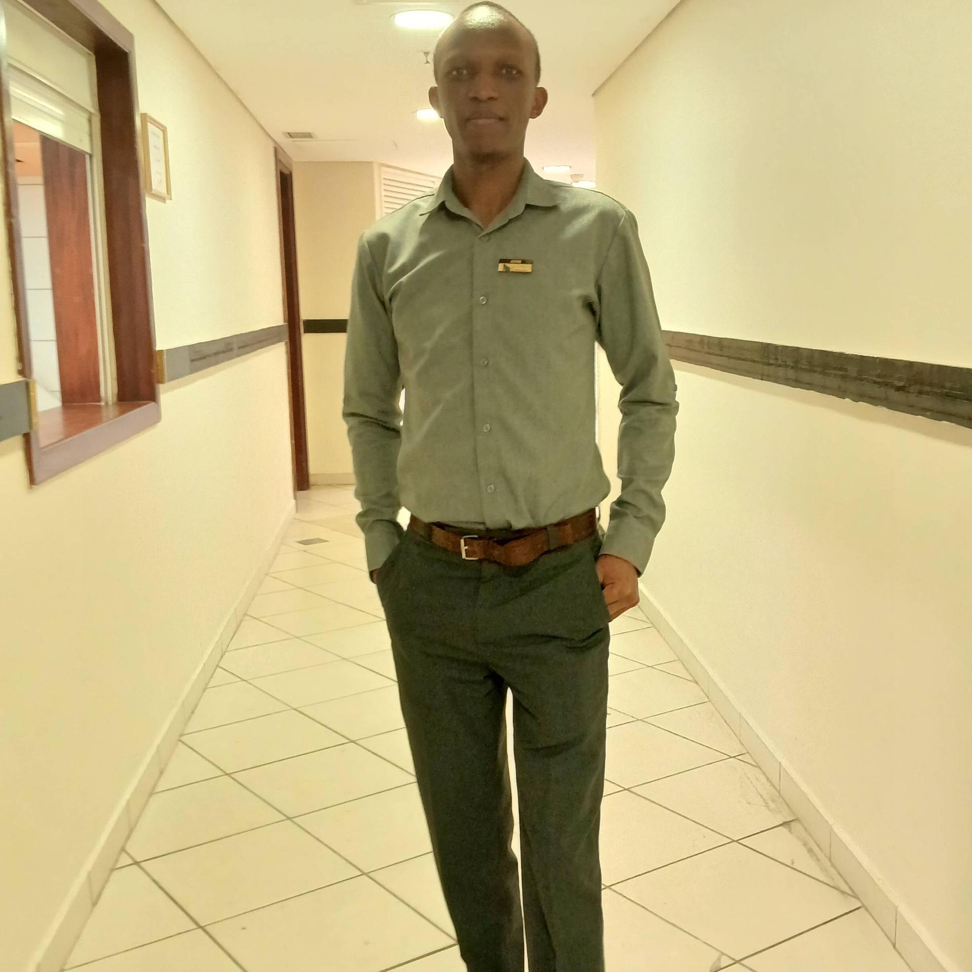 JOHN KAMAU